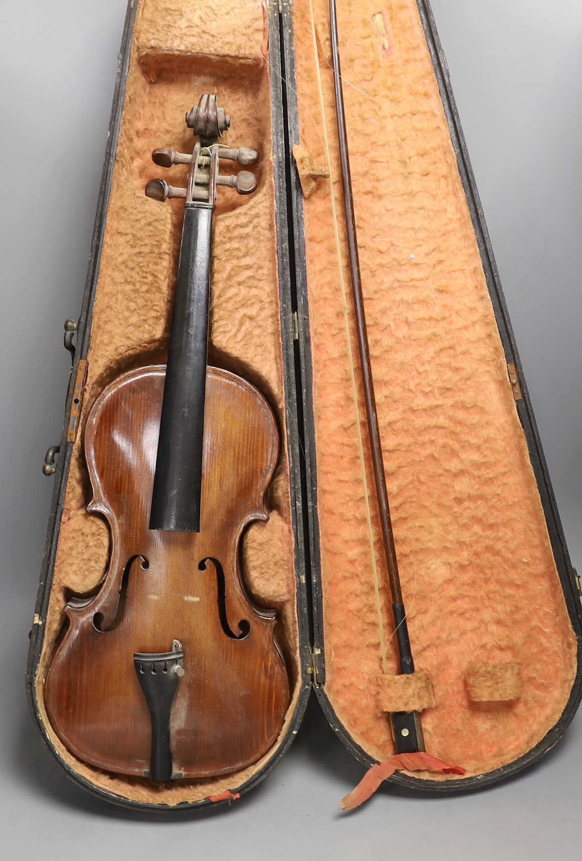 A cased 19th century violin